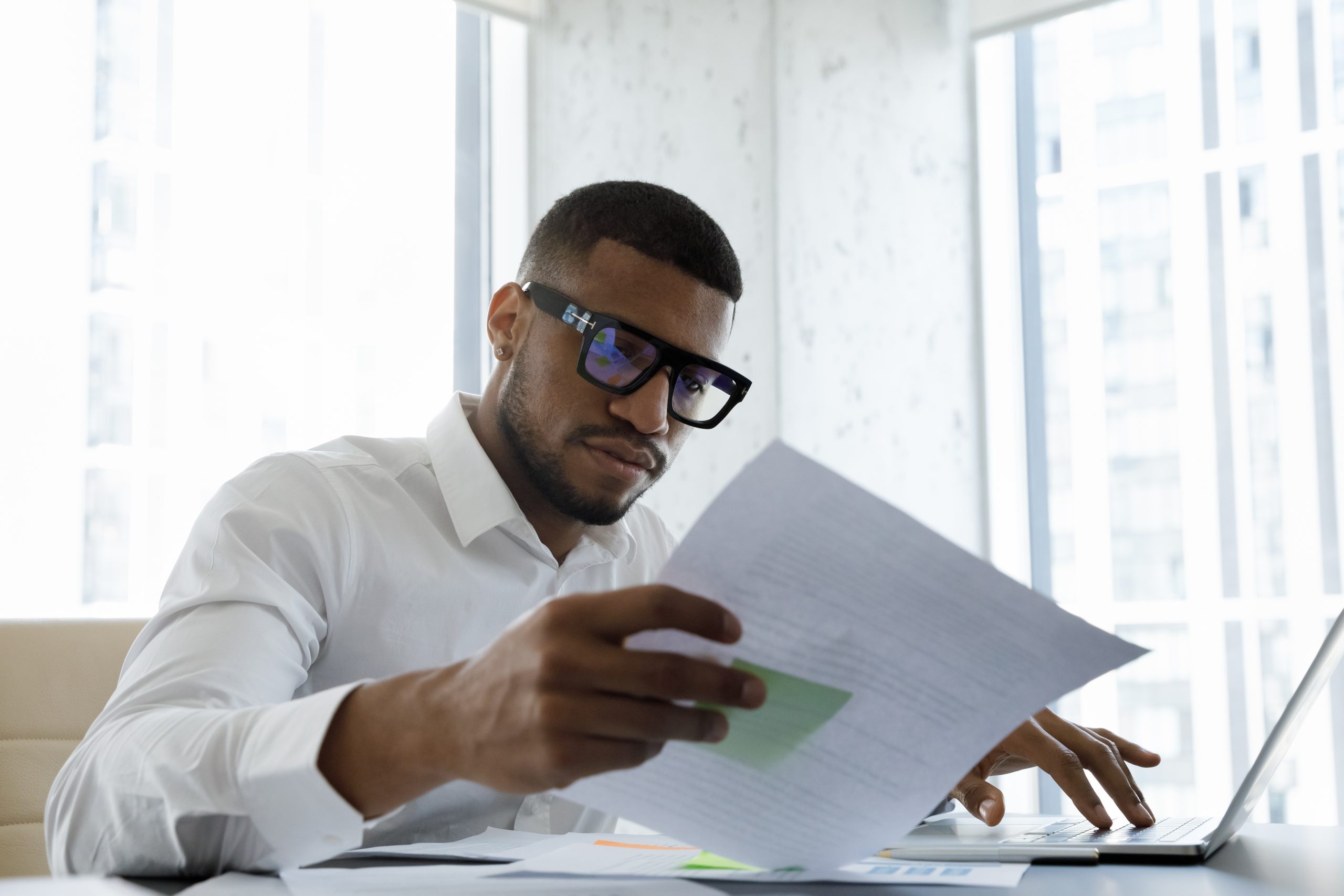 Man sorting through paperwork